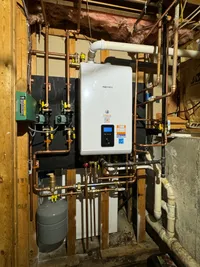 Navien Tankless Water Heater with Pinette Plumbing Sticker