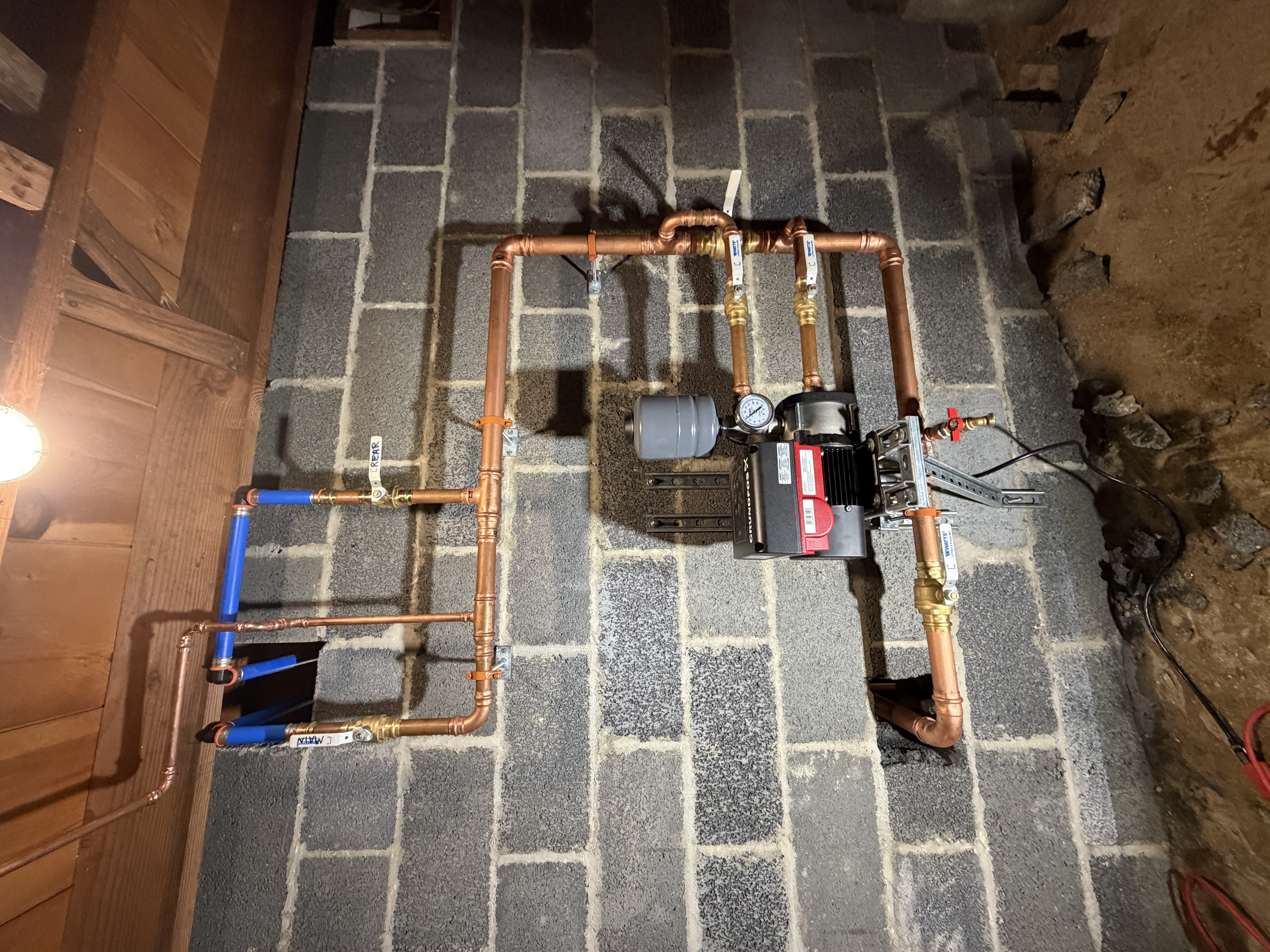 Basement pump installation completed by Pinette Plumbing