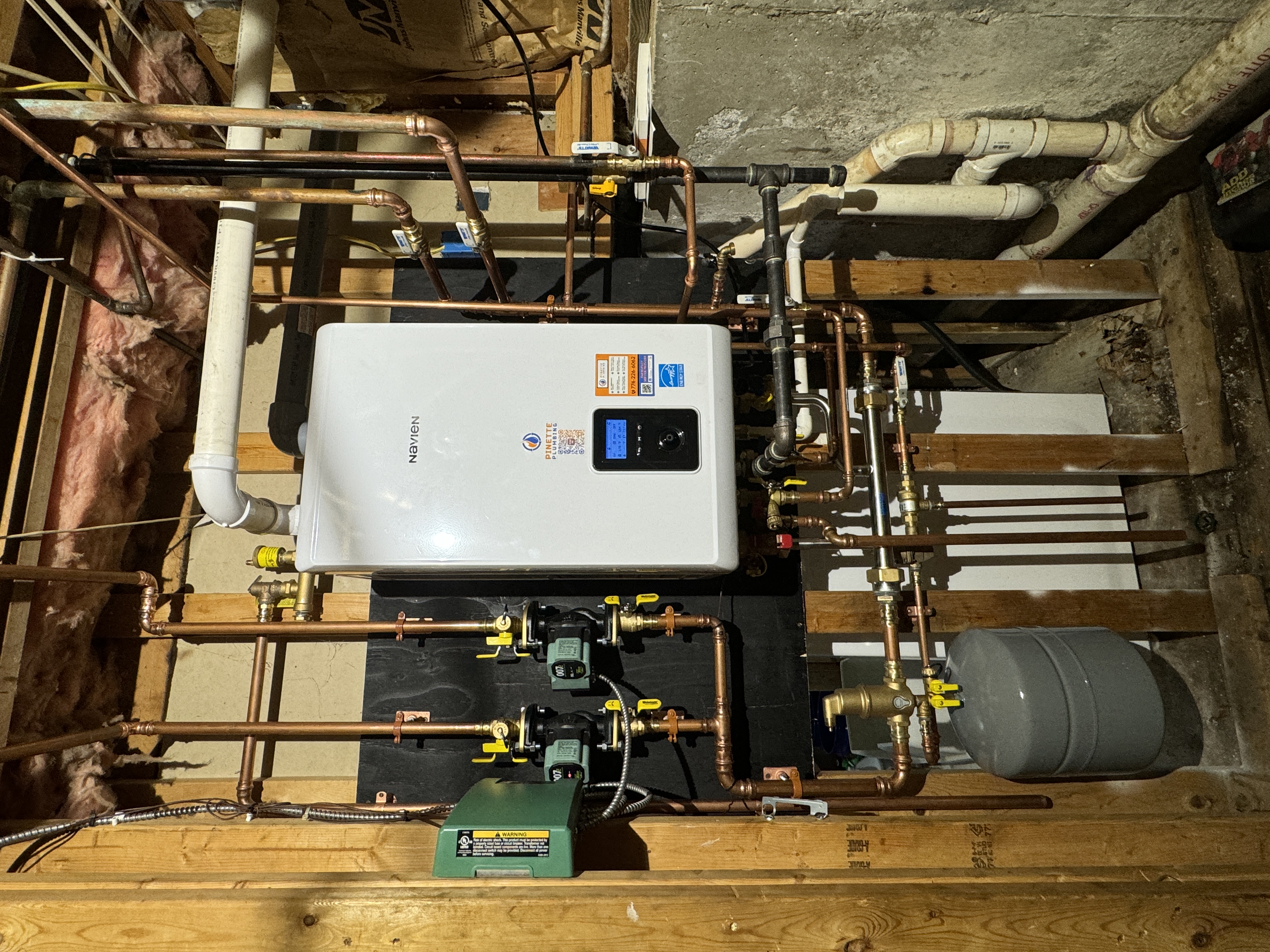 Navien Tankless Water Heater with Pinette Plumbing Sticker