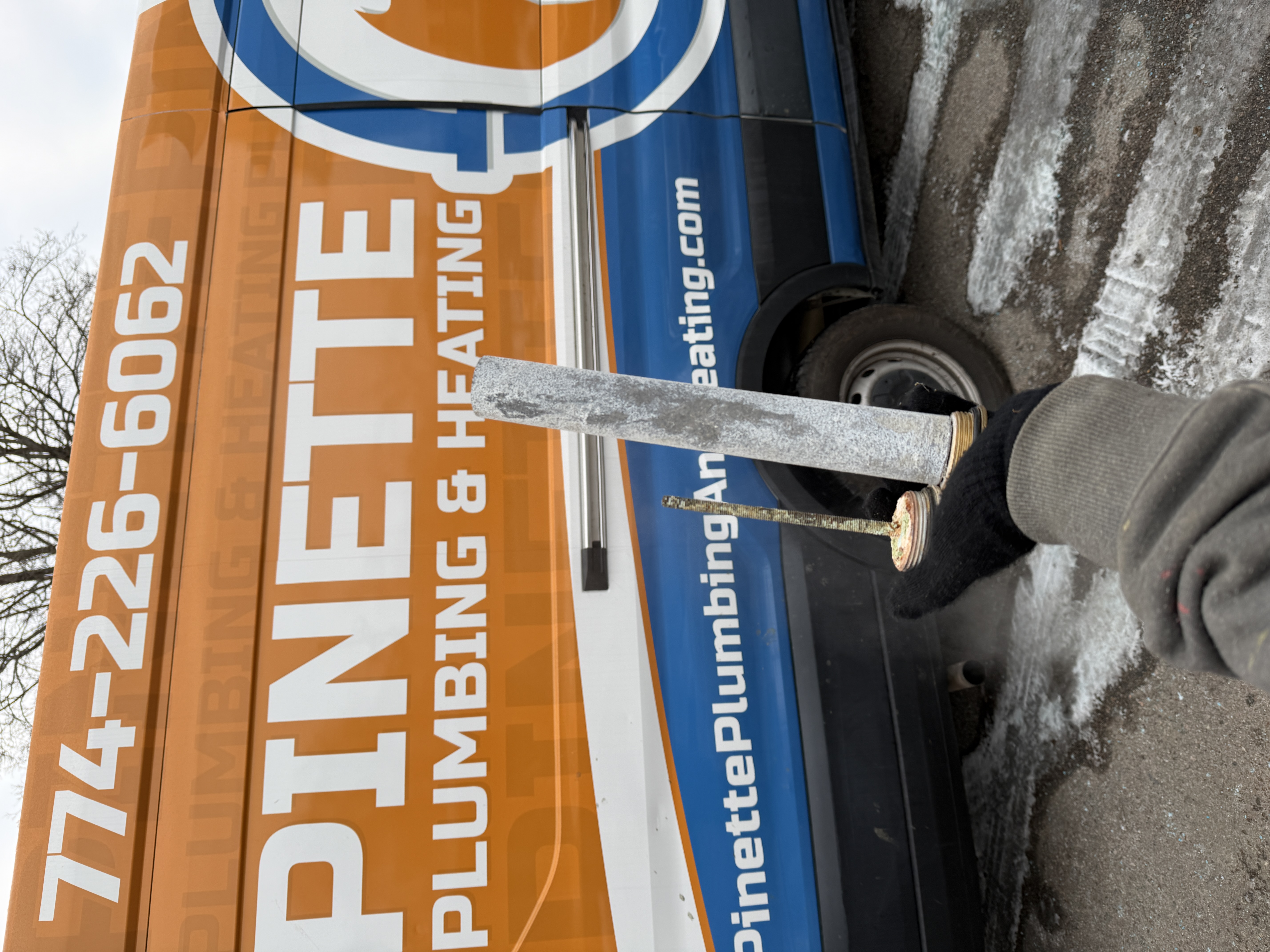 Scale buildup on anode rod from a water heater